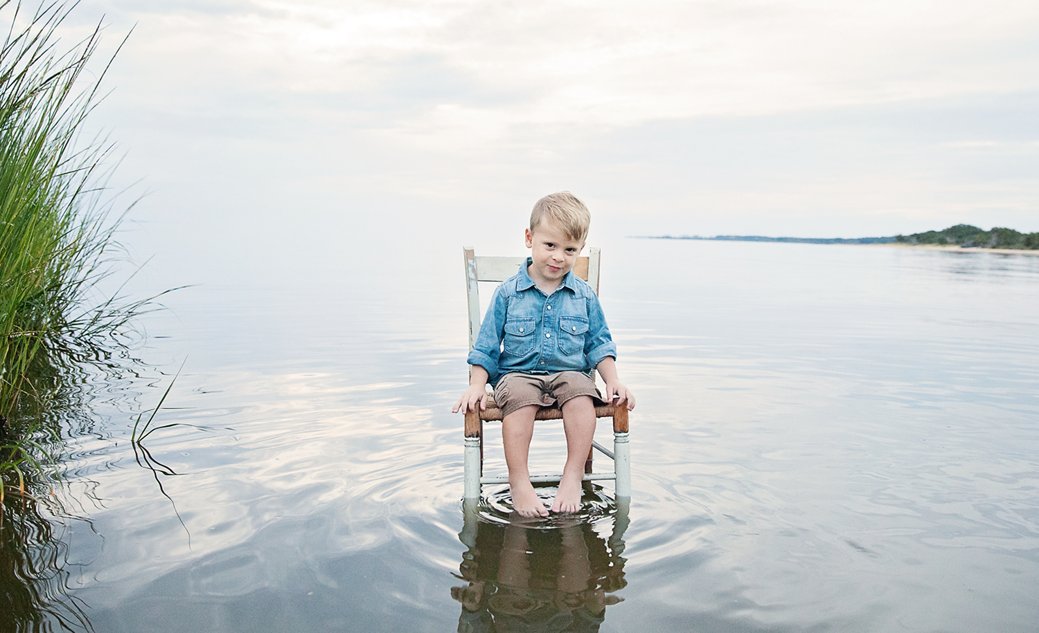 Young boy in a chair in the Pamlico Sound