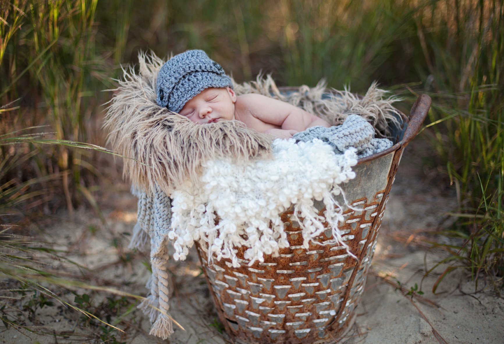Outer Banks NC newborn photo of baby boy in metal bucket